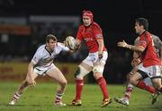 30 December 2011; Billy Holland, Munster, is tackled by Chris Farrell, Ulster. Celtic League, Ulster v Munster, Ravenhill Park, Belfast, Co. Antrim. Picture credit: Oliver McVeigh / SPORTSFILE