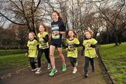 10 January 2012; European Cross Country Champion Fionnuala Britton today launched the Great Ireland Run 2012 which will take place on Sunday 15th April in the Phoenix Park. This year, for the first time, the Run will be preceded by a Mini Run for 5 to 8 year olds. Getting some training tips from Fionnuala Britton were children left to right, Daniel Hayes, age 6, Zena Donnelly, age 9, Abbie Cleere, age 6 and Luke Hayes, age 6, all from Blackrock, Co. Dublin. Entries for the Run can be made through www.greatirelandrun.org. Great Ireland Run 2012 Launch, Merrion Square, Dublin. Picture credit: David Maher / SPORTSFILE