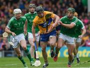 4 June 2017; Tony Kelly of Clare in action against Seamus Hickey, 7, and Sean Finn of Limerick during the Munster GAA Hurling Senior Championship Semi-Final match between Limerick and Clare at Semple Stadium, in Thurles, Co. Tipperary. Photo by Ray McManus/Sportsfile