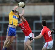 15 January 2012; Ger Quinlan, Clare, in action against James Fitzpatrick and Fiacra Lynch,10, Cork. McGrath Cup Football, Quarter-Final, Cork v Clare, Pairc Ui Rinn, Cork. Picture credit: Matt Browne / SPORTSFILE