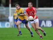 15 January 2012; Pearse O'Neill, Cork, in action against Ger Quinlan, Clare. McGrath Cup Football, Quarter-Final, Cork v Clare, Pairc Ui Rinn, Cork. Picture credit: Matt Browne / SPORTSFILE