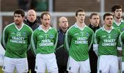 22 January 2012; Fermanagh manager Peter Canavan, back centre, along with his assistant managers Enda Kilpatrick, left, and Kieran Donnelly, right, stand behind players, from left, Seamus Quigley, Conor Quigley, Barry Owens and Ryan McCluskey during the National Anthem. Power NI Dr. McKenna Cup, Semi-Final, Tyrone v Fermanagh, Morgan Athletic Grounds, Armagh. Picture credit: Oliver McVeigh / SPORTSFILE