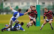 25 January 2012; Jack Hastings, Wesley College, in action against Alexander McCauley, 4, and Alex Waters, St. Andrew’s School. Powerade Leinster Schools Vinnie Murray Cup, Semi-Final, Wesley College v St. Andrew’s School, Seapoint RFC, Killiney, Co. Dublin. Picture credit: Brian Lawless / SPORTSFILE