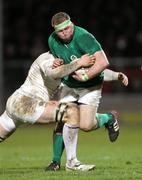 28 January 2012; Brett Wilkinson, O2 Ireland Wolfhounds, is tackled by Matt Garvey, England Saxons. England Saxons v O2 Ireland Wolfhounds, Sandy Park, Exeter, Devon, England. Picture credit: Matt Impey / SPORTSFILE