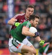 11 June 2017; Chris Barrett of Mayo in action against Michael Lundy of Galway during the Connacht GAA Football Senior Championship Semi-Final match between Galway and Mayo at Pearse Stadium, in Salthill, Galway. Photo by Ray McManus/Sportsfile