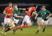 3 February 2012; Sam Davies, Wales, is tackled by Aaron Conneely, Ireland. U20 Six Nations Championship, Ireland v Wales, Dubarry Park, Athlone, Co. Westmeath. Photo by Sportsfile