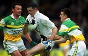 16 June 2002; Dermot Earley of Kildare in action against Offaly's John Hurst, right, and Sean Grennan during the Bank of Ireland Leinster Senior Football Championship Semi-Final match between Kildare and Offaly at Nowlan Park in Kilkenny. Photo by Ray McManus/Sportsfile