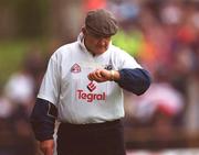 16 June 2002; Kildare manager Mick O'Dwyer checks his watch in the dying moments of the game during the Bank of Ireland Leinster Senior Football Championship Semi-Final match between Kildare and Offaly at Nowlan Park in Kilkenny. Photo by Ray McManus/Sportsfile