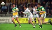 16 June 2002; Ken Doyle of Kildare in action against Pascal Kellaghan of Offaly during the Bank of Ireland Leinster Senior Football Championship Semi-Final match between Kildare and Offaly at Nowlan Park in Kilkenny. Photo by Ray McManus/Sportsfile