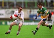 16 June 2002; Eddie McCormack of Kildare in action against Cathal Daly of Offaly during the Bank of Ireland Leinster Senior Football Championship Semi-Final match between Kildare and Offaly at Nowlan Park in Kilkenny. Photo by Ray McManus/Sportsfile