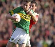 23 June 2002; Marc î SŽ of Kerry in action against Cork's Fionan Murray during the Bank of Ireland Munster Senior Football Championship Semi-Final Replay match between Cork and Kerry at Páirc U’ Chaoimh in Cork. Photo by Brendan Moran/Sportsfile