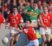 23 June 2002; Kerry's Noel Kennelly has a shot blocked by Cork's Jim O'Donoghue during the Bank of Ireland Munster Senior Football Championship Semi-Final Replay match between Cork and Kerry at Páirc U’ Chaoimh in Cork. Photo by Brendan Moran/Sportsfile