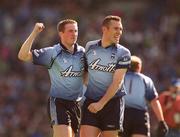 23 June 2002; Dublin's Coman Goggins, left, and team-mate Ciaran Whelan celebrate following their side's victory during the Bank of Ireland Leinster Senior Football Championship Semi-Final match between Dublin and Meath at Croke Park in Dublin. Photo by Ray McManus/Sportsfile