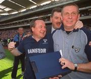 23 June 2002; Dublin Manager Tommy Lyons, left, celebrates with County Board Secretary John Costello, centre, and selector Paul Caffrey following their side's victory during the Bank of Ireland Leinster Senior Football Championship Semi-Final match between Dublin and Meath at Croke Park in Dublin. Photo by Damien Eagers/Sportsfile