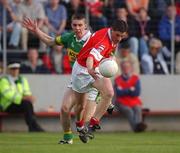 23 June 2002; Fionan Murray of Cork in action against Marc î SŽ of Kerry during the Bank of Ireland Munster Senior Football Championship Semi-Final Replay match between Cork and Kerry at Páirc U’ Chaoimh in Cork. Photo by Brendan Moran/Sportsfile