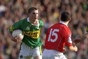 23 June 2002; Marc î SŽ of Kerry reacts to a challenge from Cork's Fionan Murray during the Bank of Ireland Munster Senior Football Championship Semi-Final Replay match between Cork and Kerry at Páirc U’ Chaoimh in Cork. Photo by Brendan Moran/Sportsfile