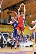 3 February 2012; Kyle Hosford, UCC Demons, in action against Rob Lynch, UL Eagles. Basketball Ireland Men's Superleague Cup Final, UL Eagles v UCC Demons, National Basketball Arena, Tallaght, Co. Dublin. Picture credit: Brendan Moran / SPORTSFILE