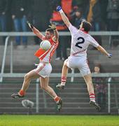 5 February 2012; Eugene McVerry, Armagh, in action against Ray Carey, Cork. Allianz Football League, Division 1, Round 1, Armagh v Cork, Morgan Athletic Grounds, Armagh. Picture credit: David Maher / SPORTSFILE