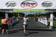 17 June 2017; Kevin Maunsell crosses the finish line to win the Irish Runner 5 Mile at the Phoenix Park in Dublin. Photo by Sam Barnes/Sportsfile