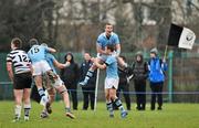 8 February 2012; St. Michael’s College's Rory Kavanagh jumps to celebrates with team-mate Nick McCarthy at the end of the game. Powerade Leinster Schools Senior Cup, 1st Round Replay, St. Michael’s College v Cistercian Roscrea, NUI Maynooth, Maynooth, Co. Kildare. Picture credit: David Maher / SPORTSFILE