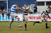 9 February 2012; Aidan O'Brien, Belvedere College, is tackled by Conor Dean, Blackrock College. Powerade Leinster Schools Junior Cup, 1st Round, Belvedere College v Blackrock College, Donnybrook Stadium, Donnybrook, Dublin. Picture credit: Matt Browne / SPORTSFILE