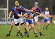 9 February 2012; Bill Beckett, left, with support from team-mate Joe Gallagher, right, University of Limerick, in action against Niall Ring, right, St Patrick's Mater Dei and Martin Quilty, left. Irish Daily Mail Fitzgibbon Cup, Group C, St Patrick's Mater Dei v University of Limerick, Na Fianna GAA Club, Mobhi Road, Dublin. Picture credit: Barry Cregg / SPORTSFILE