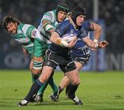 9 February 2012; Shane Jennings, Leinster, is tackled by Benjamin Vermaak and Ignacio Fernandez Rouyet, Treviso. Celtic League, Leinster v Treviso, RDS, Ballsbridge, Dublin. Picture credit: Matt Browne / SPORTSFILE