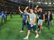 19 June 2017; Ireland players, from left, PaddyJackson, Luke McGrath and Tiernan O'Halloran, wave to the crowd during half-time in the Pearl Bowl, the American Football East Japan Shakaijin Championship Final game between the IBM BigBlue and the OBIC Seagulls, in the Tokyo Dome in Tokyo, Japan. Photo by Brendan Moran/Sportsfile