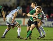 10 February 2012; Paul O'Donohoe, Connacht, is tackled by Richie Rees, Cardiff Blues, with support of team-mate Mike Patterson, left. Celtic League, Cardiff Blues v Connacht, Cardiff City Stadium, Cardiff, Wales. Picture credit: Steve Pope / SPORTSFILE