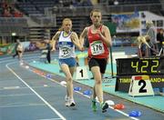 11 February 2012; Kate Veale, left, West Waterford A.C., who finished second and Laura Reynolds, Mohill A.C., Co. Leitrim, who won the Senior Women's 3km Walk at the Woodie’s DIY Senior Indoor Athletics Championships 2012. Odyssey Arena, Belfast, Co. Antrim. Photo by Sportsfile