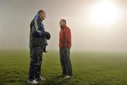11 February 2012; Mayo manager James Horan, right, with Dublin manager Pat Gilroy after the game was abandoned, due to heavy fog, by referee Marty Duffy before the start of the second half. Allianz Football League, Division 1, Round 2, Mayo v Dublin, McHale Park, Castlebar, Co. Mayo. Picture credit: David Maher / SPORTSFILE