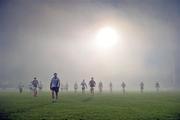 1 February 2012; Dublin and Mayo players leave the pitch at half time. The game was subsequently abandoned, due to heavy fog, by referee Marty Duffy before the start of the second half. Allianz Football League, Division 1, Round 2, Mayo v Dublin, McHale Park, Castlebar, Co. Mayo. Picture credit: David Maher / SPORTSFILE