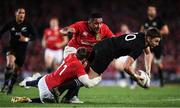 24 June 2017; Beauden Barrett of New Zealand is tackled by Elliot Daly, 11, and Mako Vunipola of the British & Irish Lions during the First Test match between New Zealand All Blacks and the British & Irish Lions at Eden Park in Auckland, New Zealand. Photo by Stephen McCarthy/Sportsfile