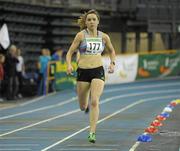 11 February 2012; Claire Bergin, Dundrum South Dublin, on the way to winning her heat in the Senior Women's 400m during the Woodie’s DIY Senior Indoor Athletics Championships 2012. Odyssey Arena, Belfast, Co. Antrim. Photo by Sportsfile