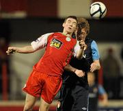 13 February 2012; Martin Donnelly, Cliftonville, in action against Chris Forrester, St Patrick's Athletic. Setanta Sports Cup, First Round, First Leg, Cliftonville v St Patrick's Athletic, Solitude, Belfast, Co. Antrim. Picture credit: Oliver McVeigh / SPORTSFILE