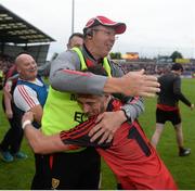 24 June 2017; Down manager Eamonn Burns and Ryan Johnston of Down celebrate after the Ulster GAA Football Senior Championship Semi-Final match between Down and Monaghan at the Athletic Grounds in Armagh. Photo by Daire Brennan/Sportsfile
