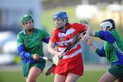 18 February 2012; Eric Reidy, Cork Institute of Technology, in action against Margaret Kirwan and Irene Leech, right, Athlone Institute of Technology. 2012 Purcell Shield Final, Cork Institute of Technology v Athlone Institute of Technology, Waterford IT, Waterford. Picture credit: Matt Browne / SPORTSFILE