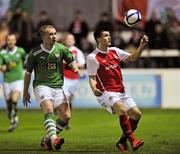 20 February 2012; Jake Kelly, St. Patrick’s Athletic, in action against Liam Boyce, Cliftonville. Setanta Sports Cup, First Round, Second Leg, St. Patrick’s Athletic v Cliftonville, Richmond Park, Dublin. Picture credit: David Maher / SPORTSFILE