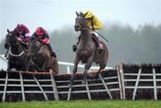 22 February 2012; Cousin Vinny, with Ruby Walsh up, right, jump the last on their way to winning the Festival Free Upgrade Offer Ends Today Hurdle from second place Won In The Dark with Andrew Lynch, centre, and third place Tofino Bay, with Davy Russell up. Punchestown Racecourse, Punchestown, Co. Kildare. Picture credit: Matt Browne / SPORTSFILE