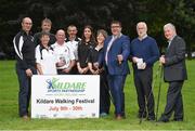 4 July 2017; RTÉ personality, and Chairman of Kildare Sports Partnership, Ray D’Arcy launched this year’s ‘Kildare Walking Festival’ along with the recently published County Kildare Tow Path Trails booklet. The Walking Festival takes place from July 9th-30th. Pictured in attendance during the Kildare Walking Festival Launch are, from left, Kildare Sports Partnership coordinator Syl Merrins, walking leaders Mary Ryan, Frank Fahy, Eddie Hennessy, John Doran, Aine Buggy and Breda Konstantin, Mayor of Kildare, Cllr. Martin Miley Jnr, Colm O'Carrol, First Secretary of Kildare Sports Partnership, and Eamon Sinnott, Towpath Trails Book designer at Herbert Park in Ballsbridge, Dublin. Photo by Seb Daly/Sportsfile