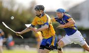 4 March 2012; Patrick Donnellan, Clare, in action against James Woodlock, Tipperary. Waterford Crystal Cup Hurling Final, Clare v Tipperary, O'Garney Park, Sixmilebridge, Co. Clare. Picture credit: Diarmuid Greene / SPORTSFILE