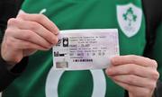 4 March 2012; An Ireland supporter with his original ticket for the game which was postponed on the 11th February, arrives at the Stade de France for the game. RBS Six Nations Rugby Championship, France v Ireland, Stade de France, Paris, France. Picture credit: Brendan Moran / SPORTSFILE