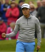 6 July 2017; Daniel Im of the United States celebrates a putt for par on the 18th green to lead on -8 during Day 1 of the Dubai Duty Free Irish Open Golf Championship at Portstewart Golf Club in Portstewart, Co Derry. Photo by Brendan Moran/Sportsfile