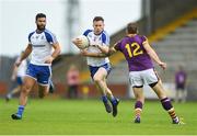 8 July 2017; Karl O'Connell of Monaghan in action against Adrian Flynn of Wexford during the GAA Football All-Ireland Senior Championship Round 2B match between Wexford and Monaghan at Innovate Wexford Park in Co Wexford. Photo by Eóin Noonan/Sportsfile