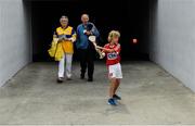 9 July 2017; Cork supporter Senan Ahern, from Ballyhooly, Co. Cork plays hurling as Clare supporters arrive before the Munster GAA Hurling Senior Championship Final match between Clare and Cork at Semple Stadium in Thurles, Co Tipperary. Photo by Brendan Moran/Sportsfile