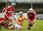 9 July 2017; Ed McQuillan of Antrim in action against Martin Quinn and Richie Mullan of Derry during the Electric Ireland Ulster GAA Hurling Minor Championship Final match between Antrim and Derry at Owenbeg in Co Derry. Photo by Oliver McVeigh/Sportsfile