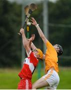 9 July 2017; Peadar McLaughlin of Derry in action against Ryan McGarry of Antrim during the Electric Ireland Ulster GAA Hurling Minor Championship Final match between Antrim and Derry at Owenbeg in Co Derry. Photo by Oliver McVeigh/Sportsfile