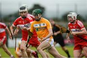 9 July 2017; Deaghlan Smith of Antrim in action against Michael McEndowney of Derry during the Electric Ireland Ulster GAA Hurling Minor Championship Final match between Antrim and Derry at Owenbeg in Co Derry. Photo by Oliver McVeigh/Sportsfile