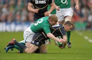 10 March 2012; Greig Laidlaw, Scotland, is tackled by Keith Earls, Ireland. RBS Six Nations Rugby Championship, Ireland v Scotland, Aviva Stadium, Lansdowne Road, Dublin. Photo by Sportsfile