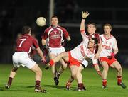 10 March 2012; Damian McCaul, Tyrone, in action against Aidan Finnan, left, and Kieran Martin, Westmeath. Allianz Football League, Division 2, Round 4, Tyrone v Westmeath, Healy Park, Omagh, Co. Tyrone. Picture credit: Oliver McVeigh / SPORTSFILE